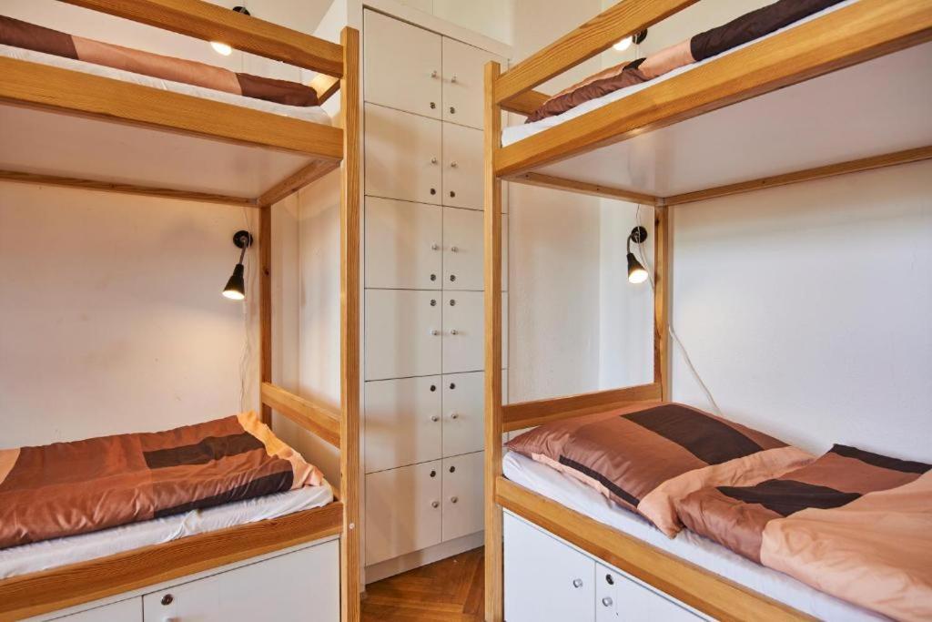 Cama em Dormitório Misto com 4 Camas