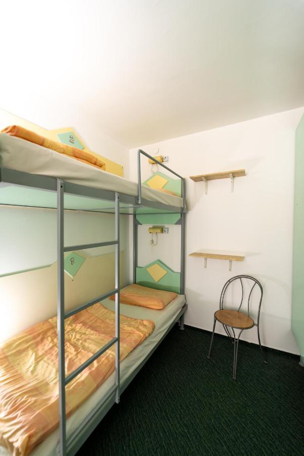 2 Beds in a 12 Bedded Male Dormitory