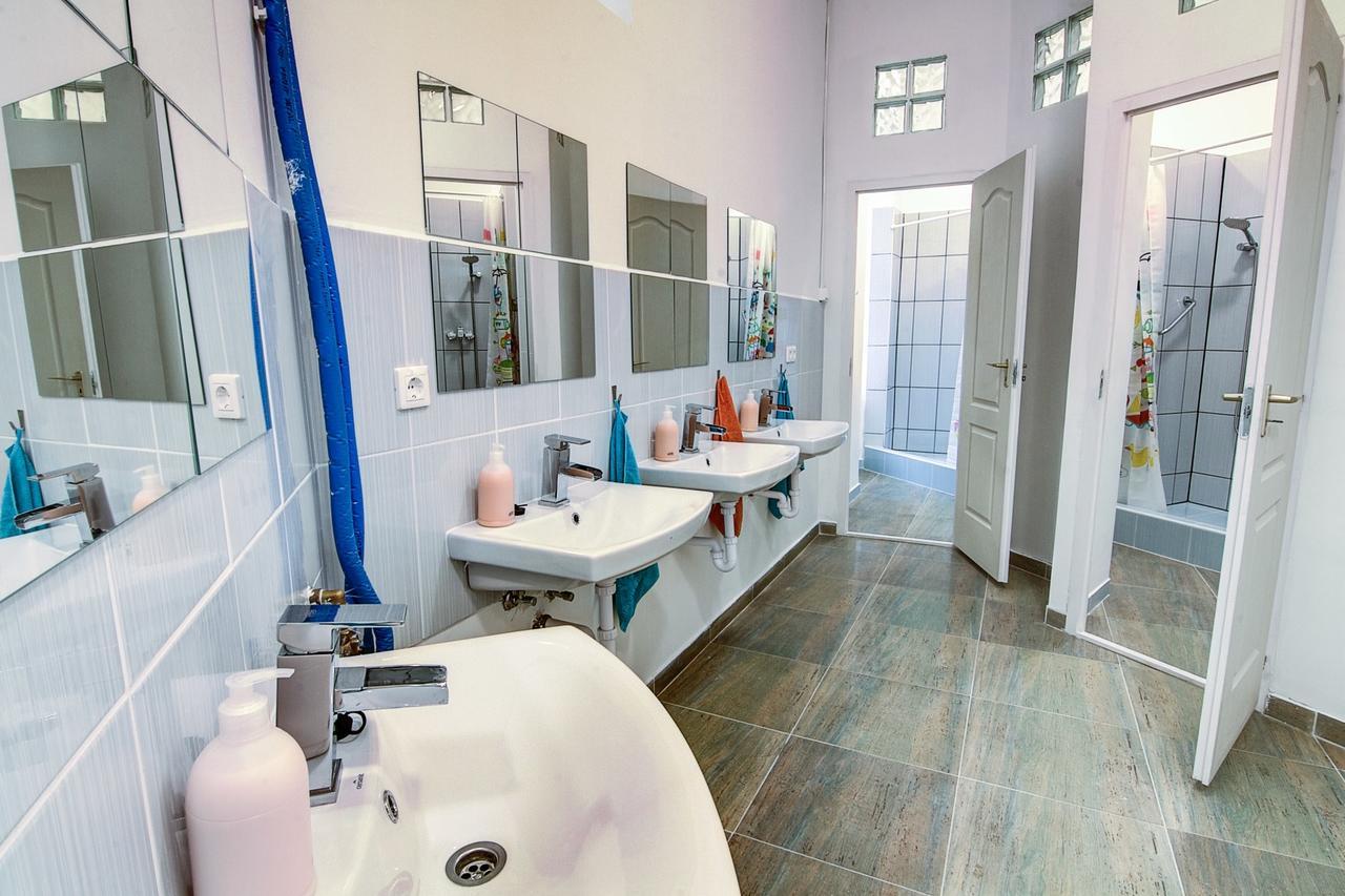 Quarto Triplo com Casa de Banho Partilhada